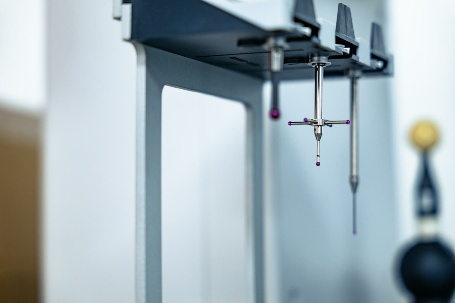Close up of a Zeiss CMM ruby tip star probe used for CNC part inspection
