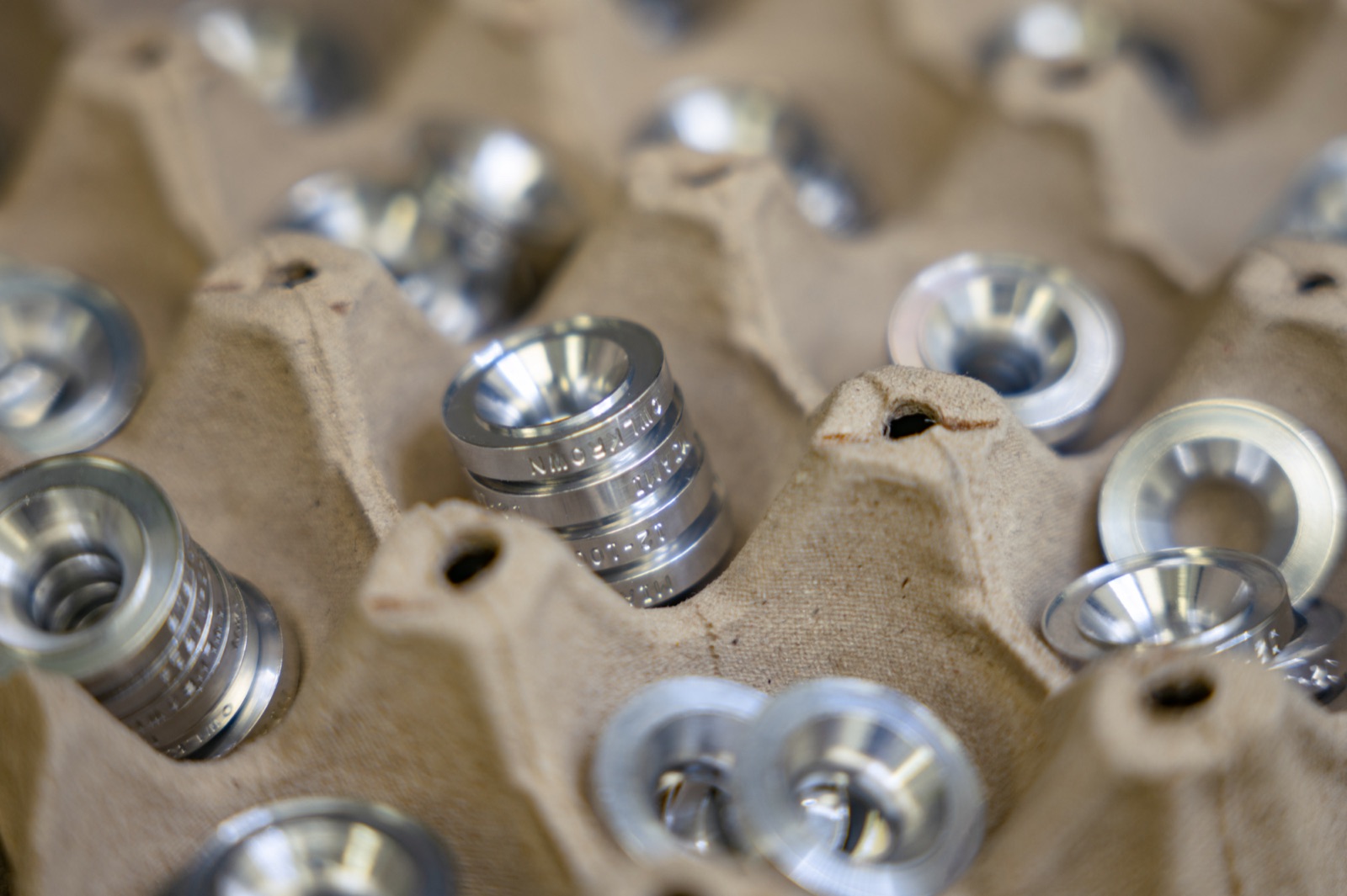A batch of CNC machined aluminum parts ready for a production run